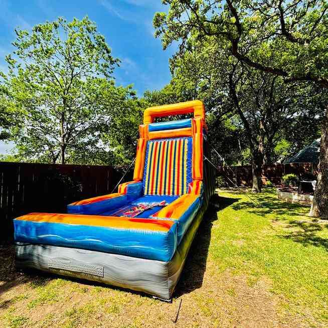 Inflatable Velcro wall rental with sticky suits for a teen and adult birthday party in DFW Texas fro…