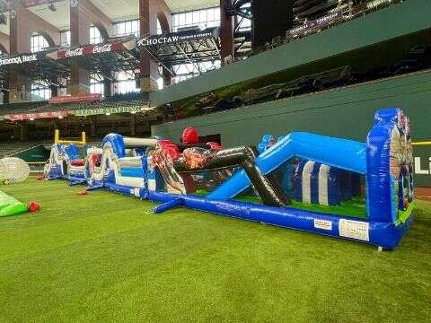 Obstacle course bounce house rentals for Waxahachie from Inflatable Party Magic featuring a 114 foot…