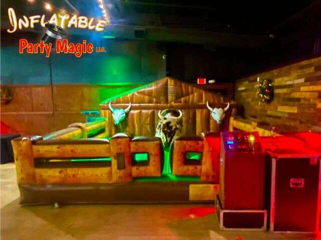 Mechanical bull rental set up at River Ranch in the Fort Worth Stockyards by Inflatable Party Magic