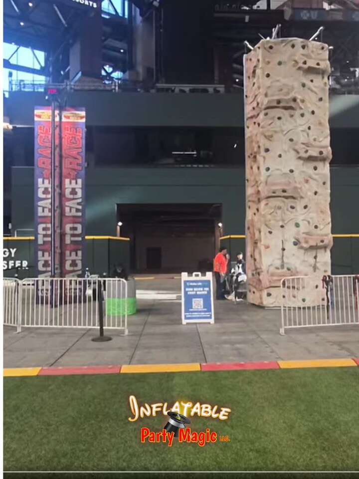 Rock climbing wall rental at large event in Globe Life Park Arlington TX from Inflatable Party Magic