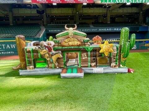 Toddler bounce house rental set up at Globe Life Park in Arlington Texas for a family event by Infla…