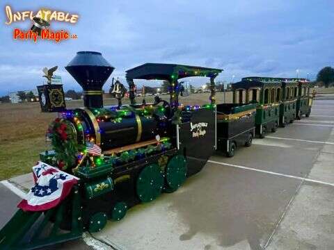 Trackless train rental giving kids rides at an event in Southlake TX from Inflatable Party Magic