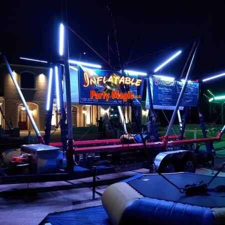 LED euro bungee trampoline rental glowing at a Grapevine night event