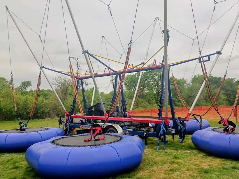 Euro bungee trampoline rental flying high at a Fort Worth event