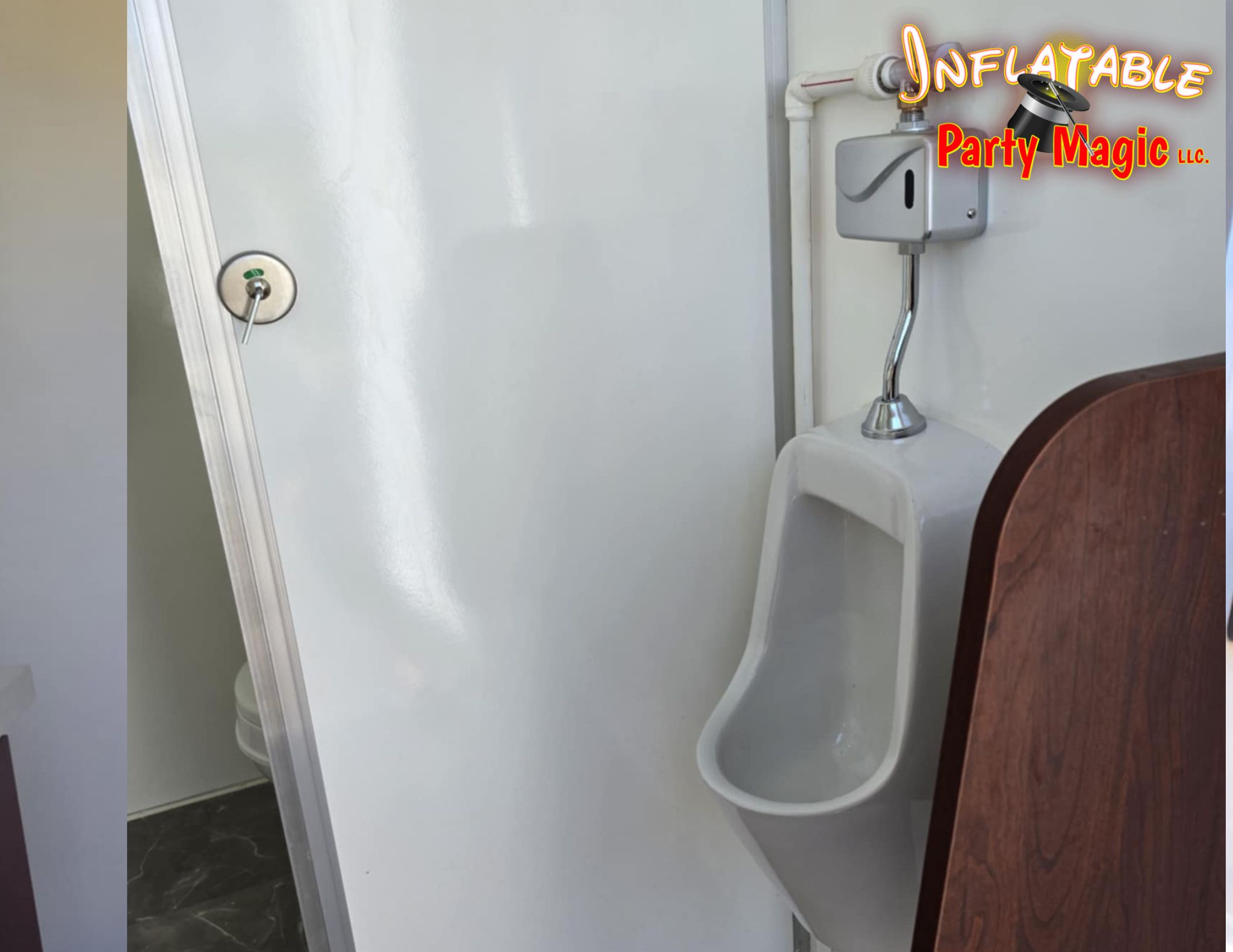 Inside urinal view of Portable Restroom Trailer Rentals DFW Tx from Inflatable Party Magic