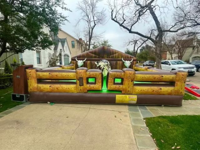 Mechanical bull rental in Arlington Texas from Inflatable Party Magic -- Galaxy Deluxe bull for corp…