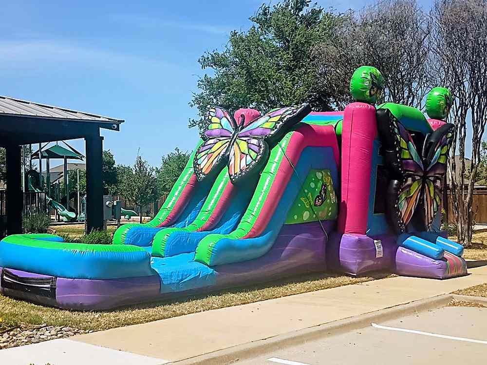 Butterfly bounce house with slide rental from Inflatable Party Magic