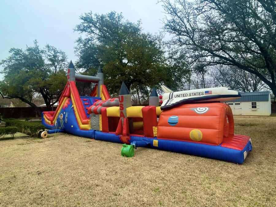 Large USA space themed inflatable obstacle course rental in Godley, TX
