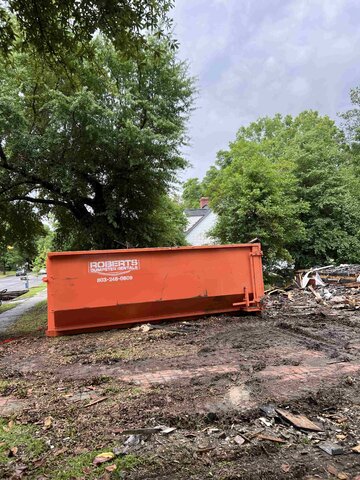 Dumpster On Site After Demolition