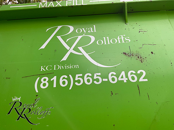 Royal Rolloffs green dumpster with company logo and contact number. Royal Rolloffs green dumpster with company logo and contact number.