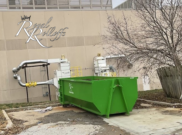 Another green roll-off dumpster provided by Royal Rolloffs for rentals.