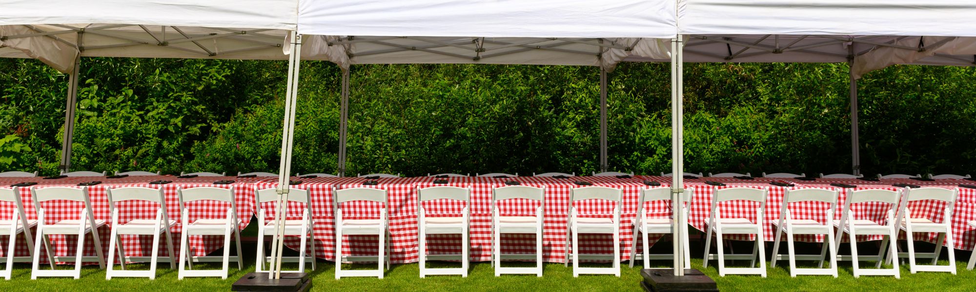 tables and chairs and tent