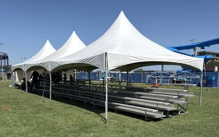 White event tent set up for a backyard party in McAllen, TX