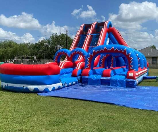 Red, white and blue water slide rental in McAllen, TX from Sky High Rentals