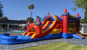 The Fortress Bounce House with Double Lane Water Slide (WET) The Fortress Bounce House with Double Lane Water Slide (WET)