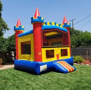 The Castle Bounce House "PARTY PACKAGE" (2 Tables, 16 Chairs, 1 Concession and The Castle Bounce House)