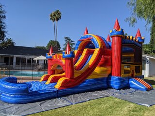 The Fortress Bounce House with Double Lane Water Slide (WET)