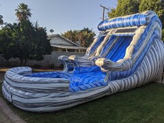 The Summer Water Slide "PARTY PACKAGE" (2 Tables, 16 Chairs, 1 Concession and The Summer Splash Water Slide)