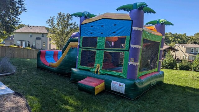 XL tropical bounce house and slide combo rental in Lee's Summit, MO
