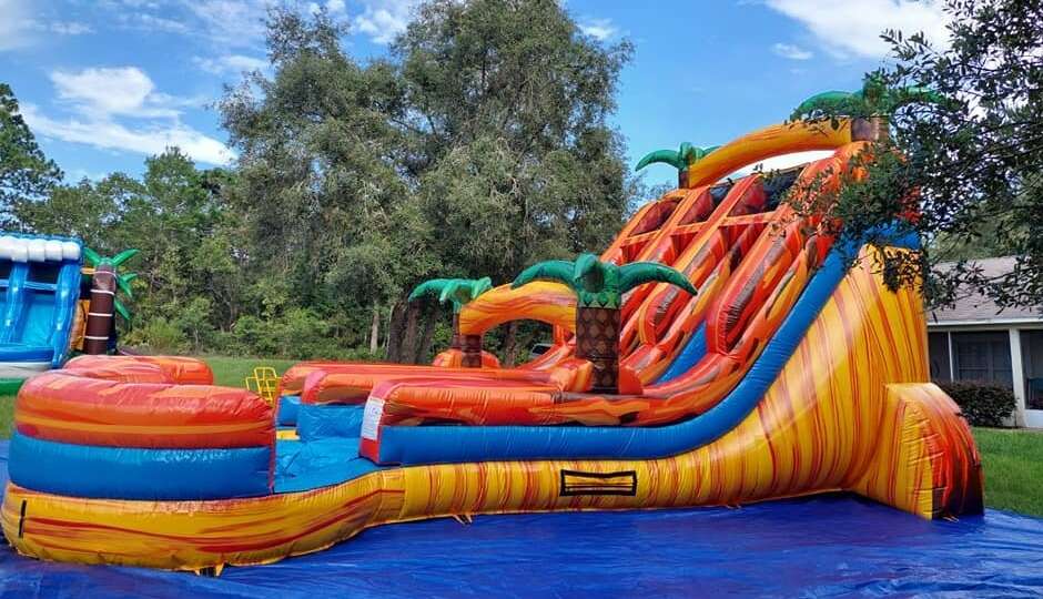 Tropical inflatable water slide rental by Sunny Inflatables in Florida