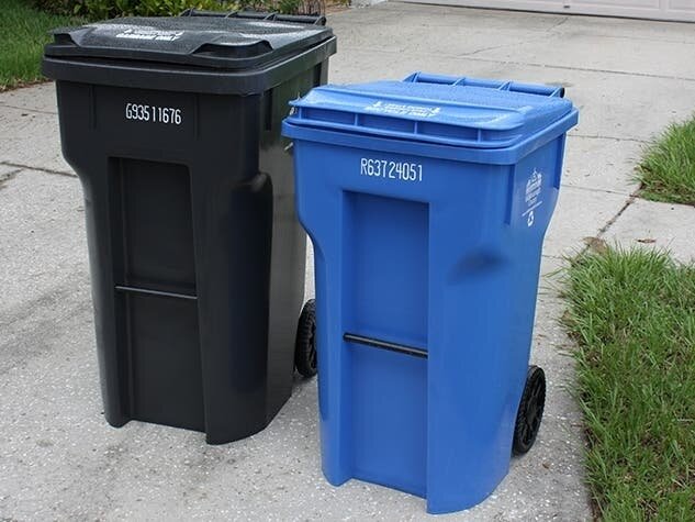 Two Trash Cans Cleaning Pressure Washing