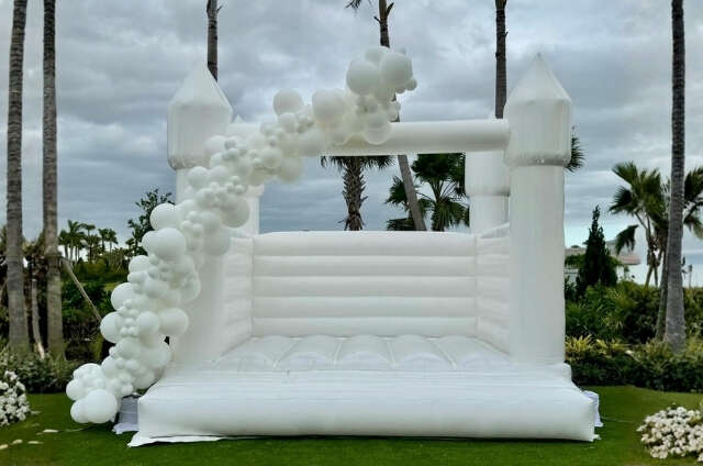 Elegant White Bounce House Rental for Weddings and Events by Treasure Coast Party Rentals Elegant White Bounce House Rental for Weddings and Events by Treasure Coast Party Rentals