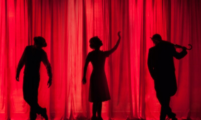 performers on stage at a live event