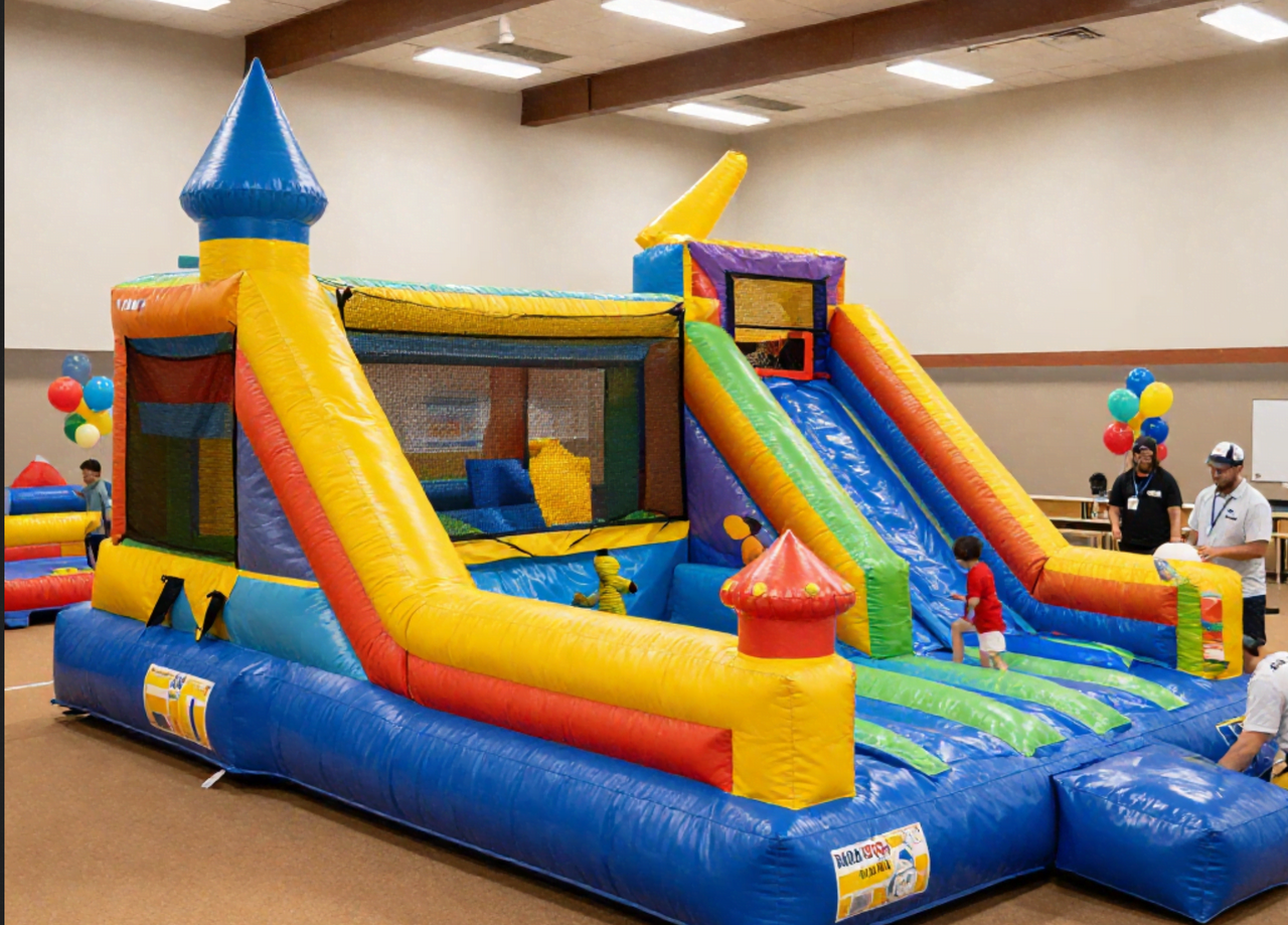 Children jumping inside inflatable bounce house during indoor school event in Anna Texas