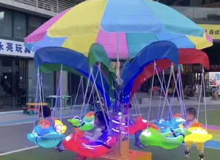Childrens Carousel Swing Ride with Fish 