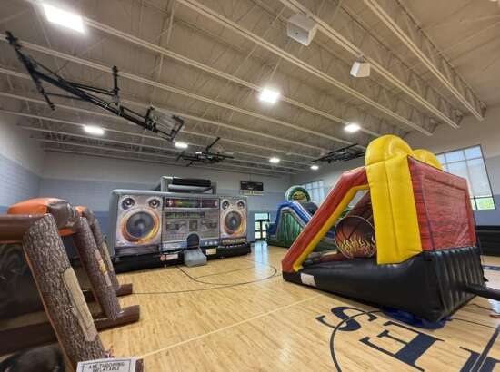 Inflatable obstacle course, interactive games, boom box bounce house set up in the indoor