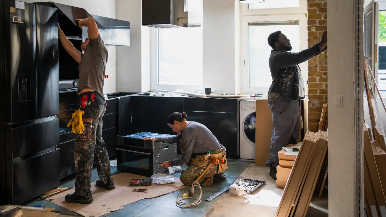 Home renovation project with crew at work, ideal for a Valley Dumpster Rentals container