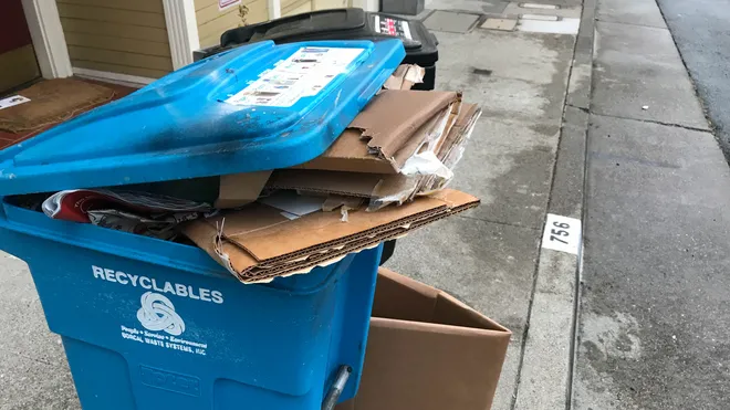 Recyclable waste bin ready for pickup by Valley Dumpster Rentals