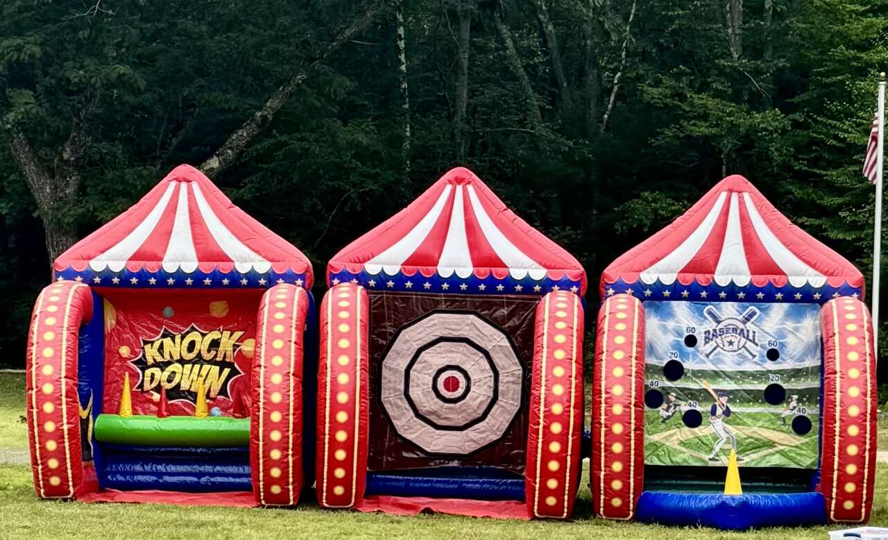 Inflatable carnival game booths including Knock Down, target toss, and baseball throw by Vertical Entertainment. Inflatable carnival game booths including Knock Down, target toss, and baseball throw by Vertical Entertainment.