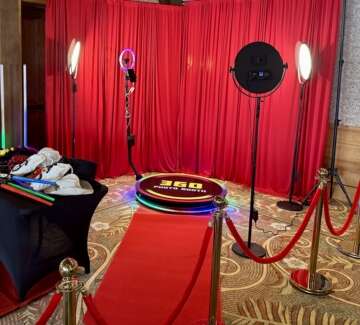 Vertical Entertainment 360 Photo Booth with red carpet and ring lights
