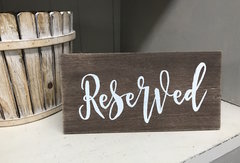 "Reserved" wooden sign