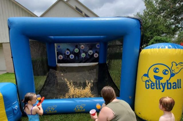 Inflatable play area providing Party rentals Gelblaster rentals