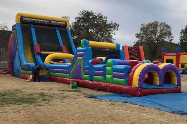 Inflatable play area providing Party rentals Gelblaster rentals