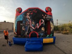13' X 13' PIRATES OF THE CARIBBEAN BOUNCE HOUSE
