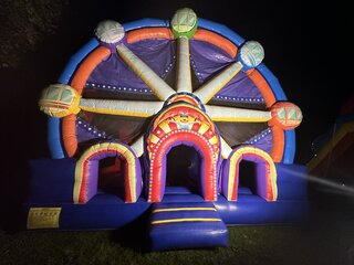 Ferris wheel bounce house with slide