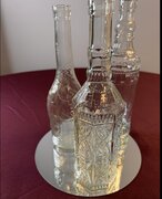 ARRAY OF WHISKEY GLASS BOTTLES