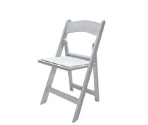 White acrylic chairs with white padding 